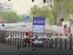 روبوت صيني يتفوق على أسرع إنسان في سباق 100 متر